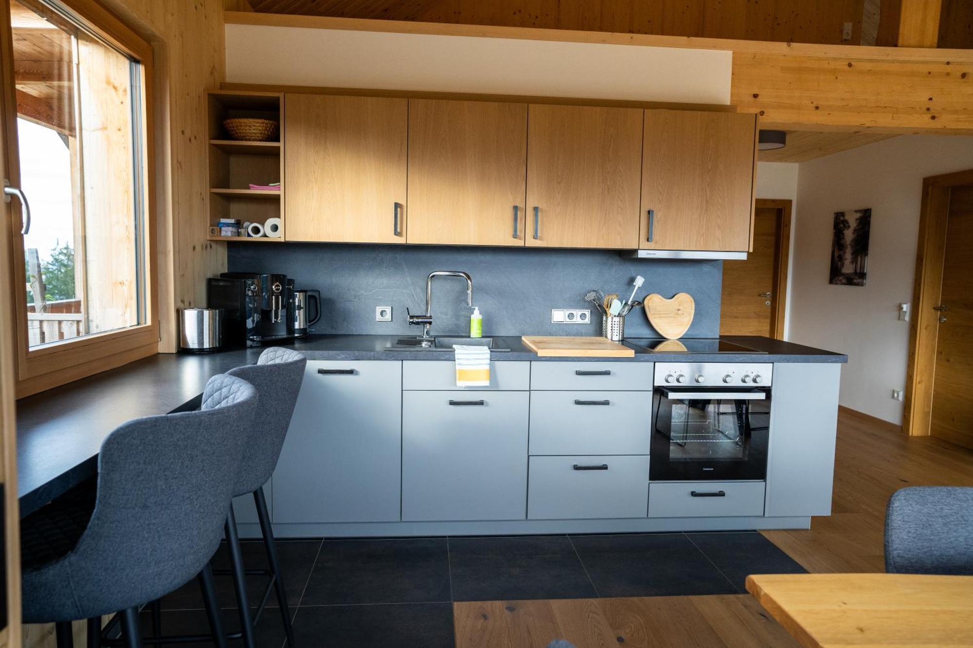Holzhaus "Zum Schwarz'N" Apartment Aurach am Hongar Bagian luar foto